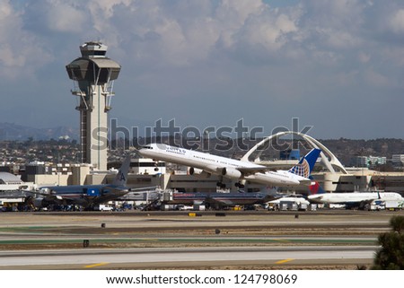 LOS ANGELES, CA - OCTOBER 23: A United Airlines passenger jet takes off from Los Angeles International Airport (LAX) in Los Angeles, CA on October 23, 2012. United is the largest airline in the world.
