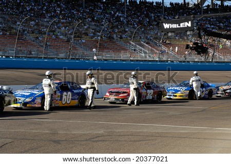 AVONDALE, AZ - NOV 7 - NASCAR Nationwide Series cars line up for the start of the race at the Phoenix International Raceway on November 7, 2008 in Avondale, Arizona.