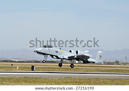 GLENDALE, AZ - MARCH 21: A U.S. Air Force A-10 Thunderbolt lands on the runway at the biennial air show (\