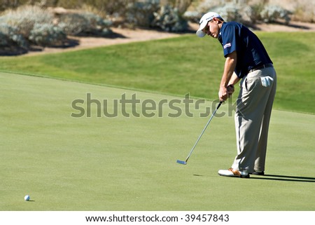 SCOTTSDALE, AZ - OCTOBER 22: D.A. Points putts in the Frys.com Open PGA golf tournament on October 22, 2009 in Scottsdale, Arizona.