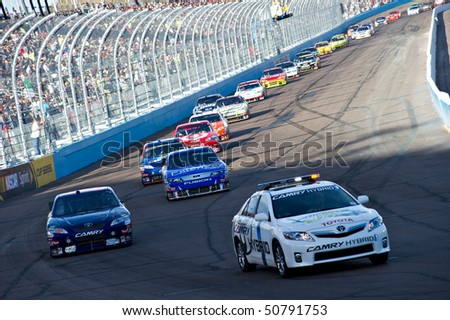 AVONDALE, AZ - APRIL 10: The pace car leads a line of cars during a yellow caution flag at the Subway Fresh Fit 600 NASCAR Sprint Cup race on April 10, 2010 in Avondale, AZ.
