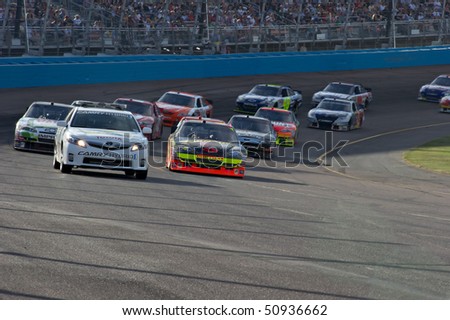 AVONDALE, AZ - APRIL 10: The pace car leads a group of cars out of turn one at the Subway Fresh Fit 600 NASCAR Sprint Cup race on April 10, 2010 in Avondale, AZ.