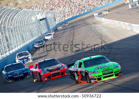 AVONDALE, AZ - APRIL 10: Mark Martin (#5) leads a group of cars into turn one at the Subway Fresh Fit 600 NASCAR Sprint Cup race on April 10, 2010 in Avondale, AZ.