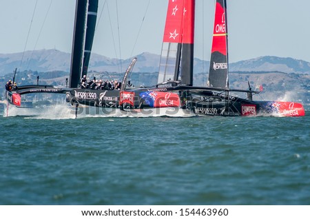 SAN FRANCISCO, CA - SEPTEMBER 12: Emirates Team New Zealand and Oracle Team USA compete in the America\'s Cup sailing races in San Francisco, CA on September 12, 2013