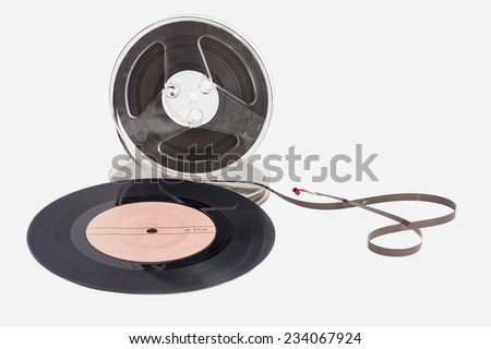 ancient audio reel tape and audio disc