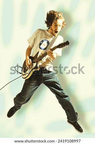 Electric guitarist leaps and shouts