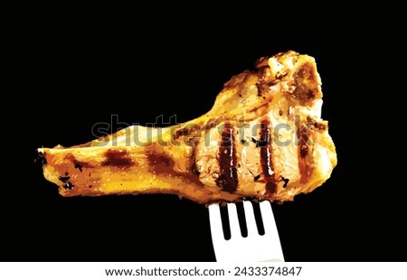 Lamb chop being held up on a fork
