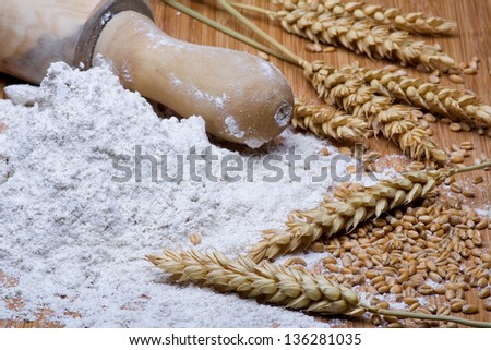 Wheat ears, grains, crushed grains and  flour, close-up