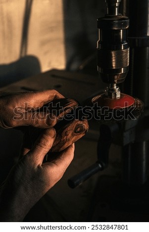 Similar – Image, Stock Photo Artisan polishing wooden detail using sandpaper in carpentry workshop