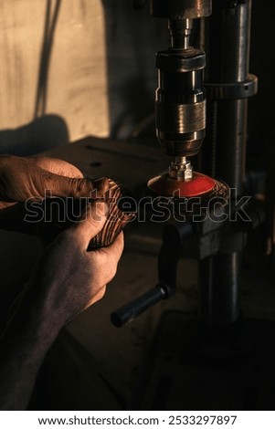 Similar – Image, Stock Photo Artisan polishing wooden detail using sandpaper in carpentry workshop