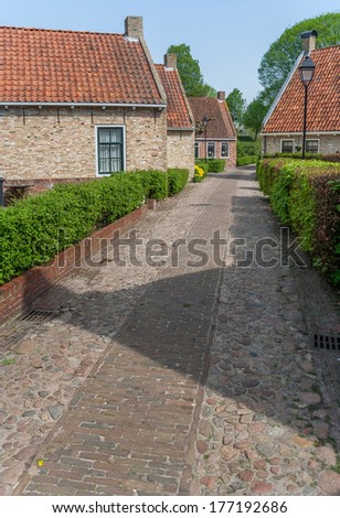 Old street in the restored village of Boertange in Groningen, the Netherlands
