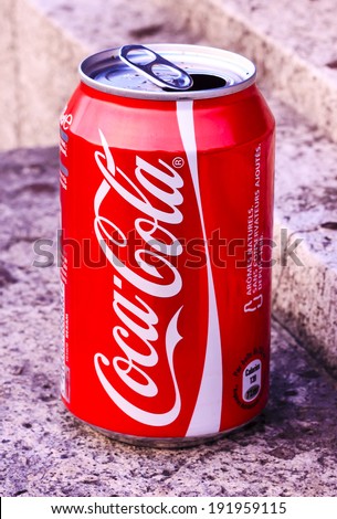 PARIS, FRANCE - MARCH 19 : Illustrative editorial image - rontal view of an opened 0.33L Original Coca-Cola can featured on the marble stone background on March 19th, 2014 in Paris, France