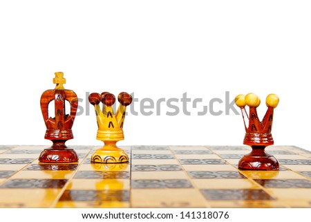 black King betrays black Queen with white queen reflected on a chessboard