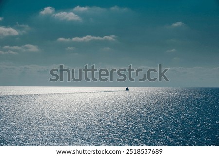 Similar – Image, Stock Photo Alone by the sea