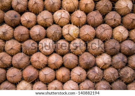 Pile of coconuts background. Food market in India