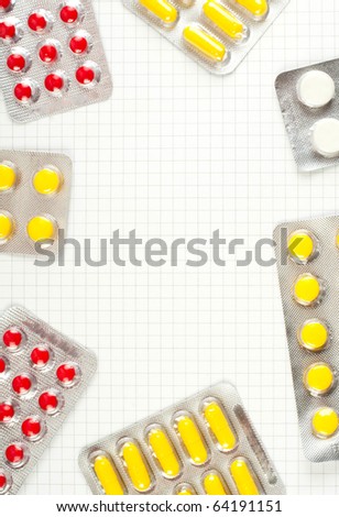 Medicine on checked paper background