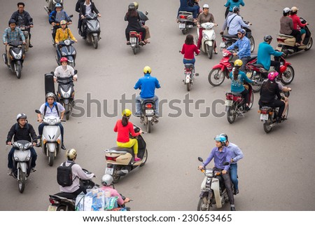 HANOI - 8 APRIL: Top view of people and traffic in Hoan Kiem district (old quarter) in Hanoi, Vietnam, on April 8, 2014.