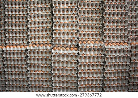 Stacks of brown eggs background
