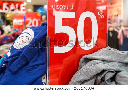 Sale sign in the clothing shop