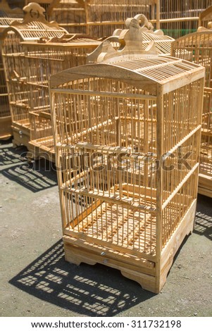 Wooden cages for birds at the Pasar Ngasem Market in Yogyakarta, Java, Indonesia.