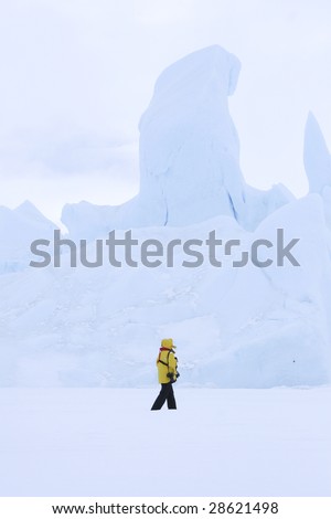 Tourist walking on the sea ice in the Weddell Sea, Antarctica
