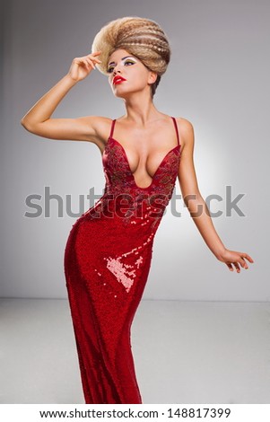 beautiful girl with modern haircut and red shiny dresses 2