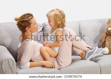 Mother and baby daughter playing 2