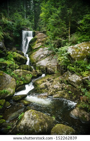 Black Forest Falls cascade of  rocks covered with moss in Trieberg, Germany