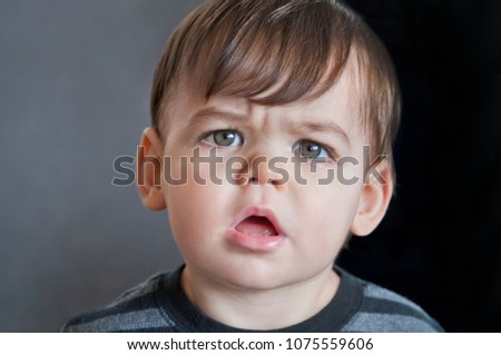 Image, Stock Photo Perplexed baby staring into the camera