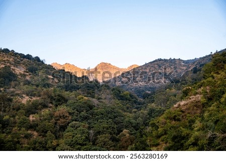 Similar – Image, Stock Photo Sunlight illuminating top of snowy mountain ridge in winter