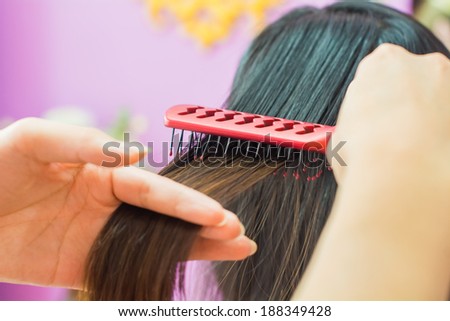 brushing hair