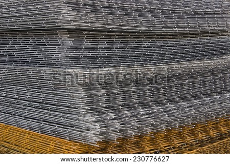 Reinforcement steel mesh background at the construction site. Mesh and bar.