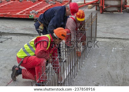 BELGRADE, SERBIA - NOVEMBER 11: Workers working on formwork for the construction of a concrete wall. At construction site in November 2014.