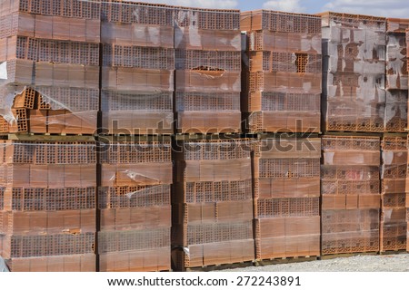 Stack of hollow clay block for building, clay block background