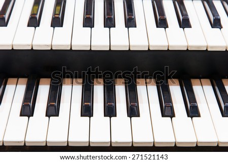 close-up of piano keys in the music room.