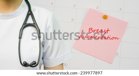 A note of a doctor appointment on a calendar- Breast augmentation