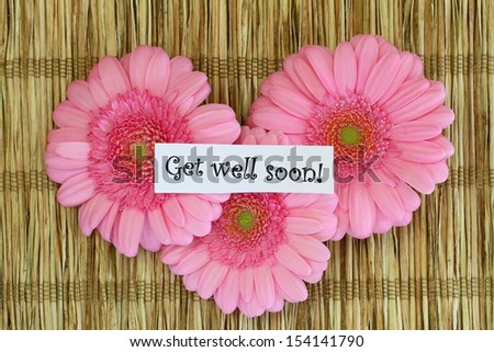Get well soon card with gerbera daisies on bamboo mat