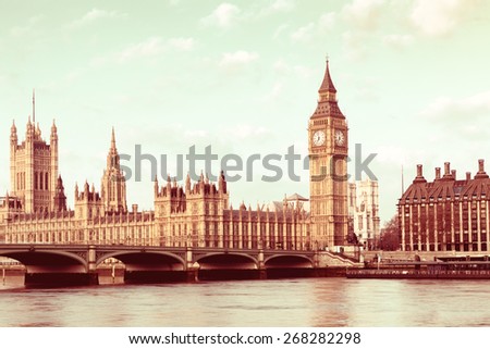 Retro Photo Filter Effect - Elizabeth Tower, Big Ben and Westminster Bridge in early morning light, London, England, UK