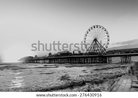 RETRO PHOTO FILTER EFFECT:  Blackpool Central Pier at Sunset with Ferris Wheel, Lancashire, England UK
