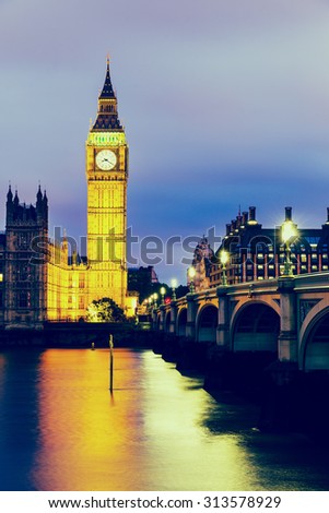 VINTAGE/RETRO PHOTO FILTER EFFECT: Elizabeth Tower, Big Ben, Houses of Westminster and Westminster Bridge from the South Bank of the River Thames at Dusk, London, England UK