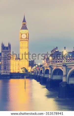 VINTAGE/RETRO PHOTO FILTER EFFECT: Elizabeth Tower, Big Ben, Houses of Westminster and Westminster Bridge from the South Bank of the River Thames at Dusk, London, England UK