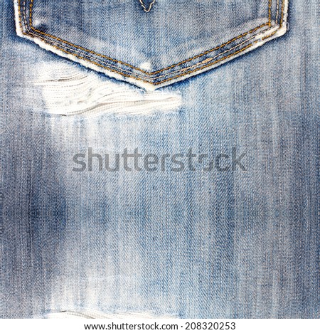 Old jeans background with hole in the style scrapbook