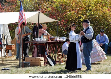 GREENBUSH, WI - SEPTEMBER 28 : A Civil War general prepares to lead his troops towards battle at the 23rd Annual Wade House Historic Site Civil War Weekend in Greenbush, WI on September 28, 2012.