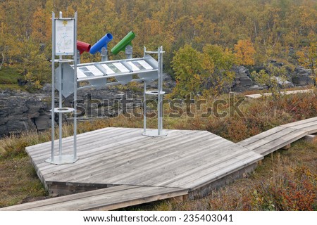 ABISKO, SWEDEN ON SEPTEMBER 09. Information desk along a trail in the National Park on September 09, 2014 in Abisko, Sweden. Newly built footbridge, information help along the canyon.