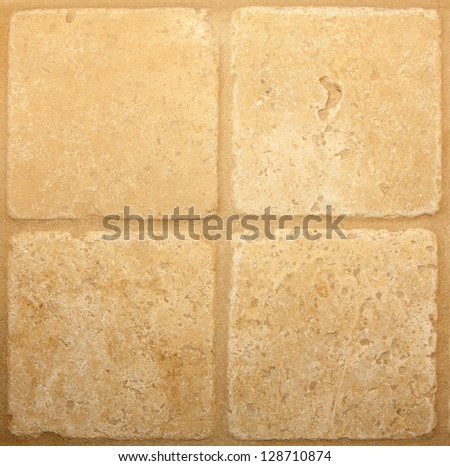 tan travertine tile pattern background with tan grout lines