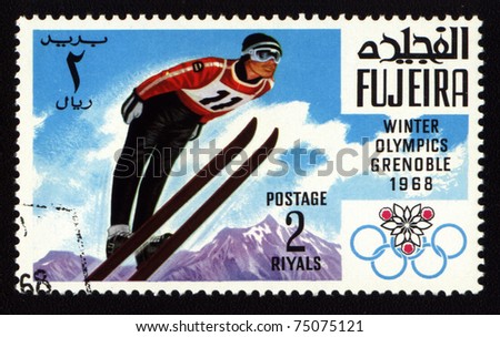 Fujeira - CIRCA 1968: A stamp printed in Fujeira shows Winter Olympic Games in Grenoble, circa 1968