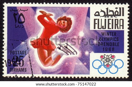 FUJEIRA - CIRCA 1968: A stamp printed in Fujeira shows Winter Olympic Games in Grenoble, circa 1968.
