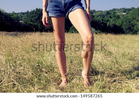Woman showing off her legs in the park