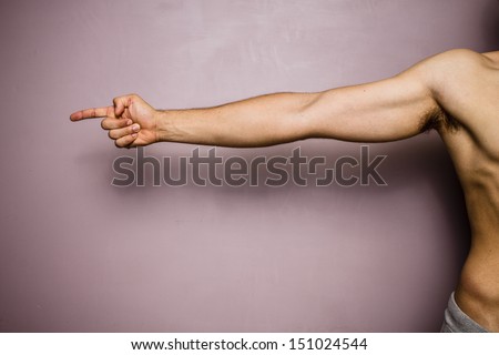 Fit male pointing right
