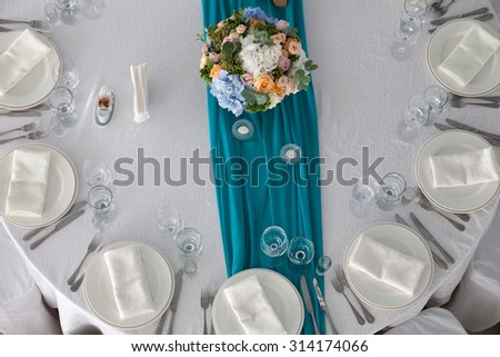 Elegance table set up for wedding in turquoise top view